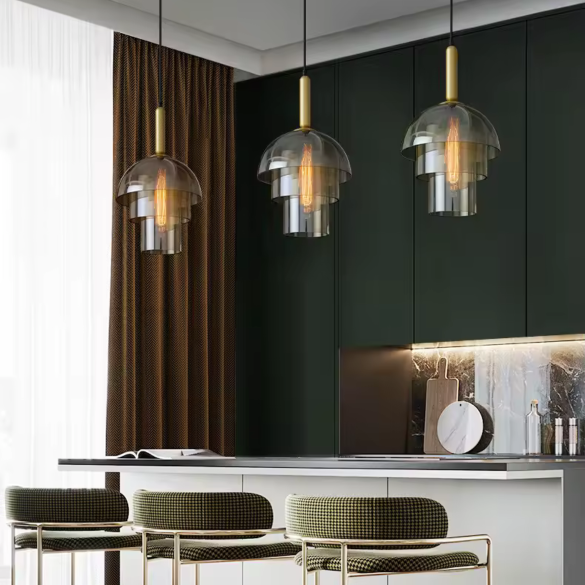 Modern kitchen interior with pendant lights, dark walls, and white countertops.