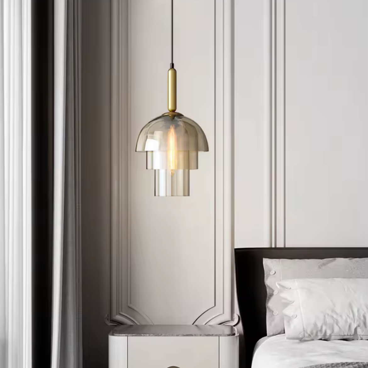 Modern bedroom with a stylish pendant light fixture.