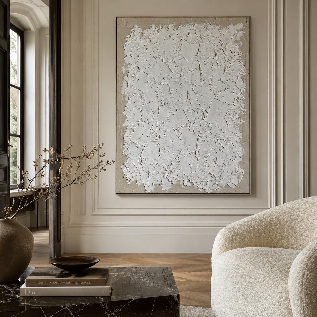 Abstract painting on a wall in a stylish living room with a sofa and decorative items.