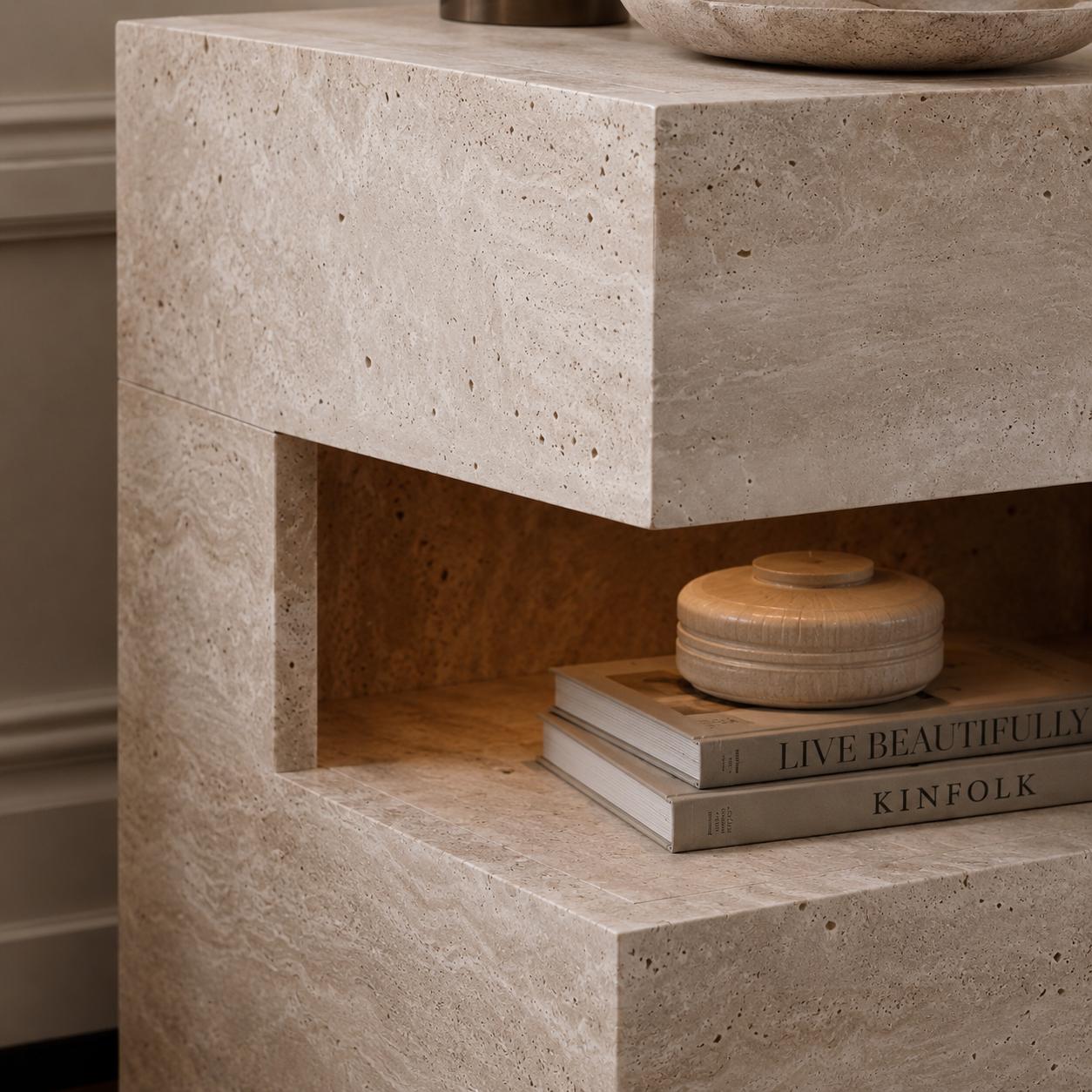 Modern travertine effect bedside table with two drawers, open display shelf, integrated LED lighting and left or right hand configuration.